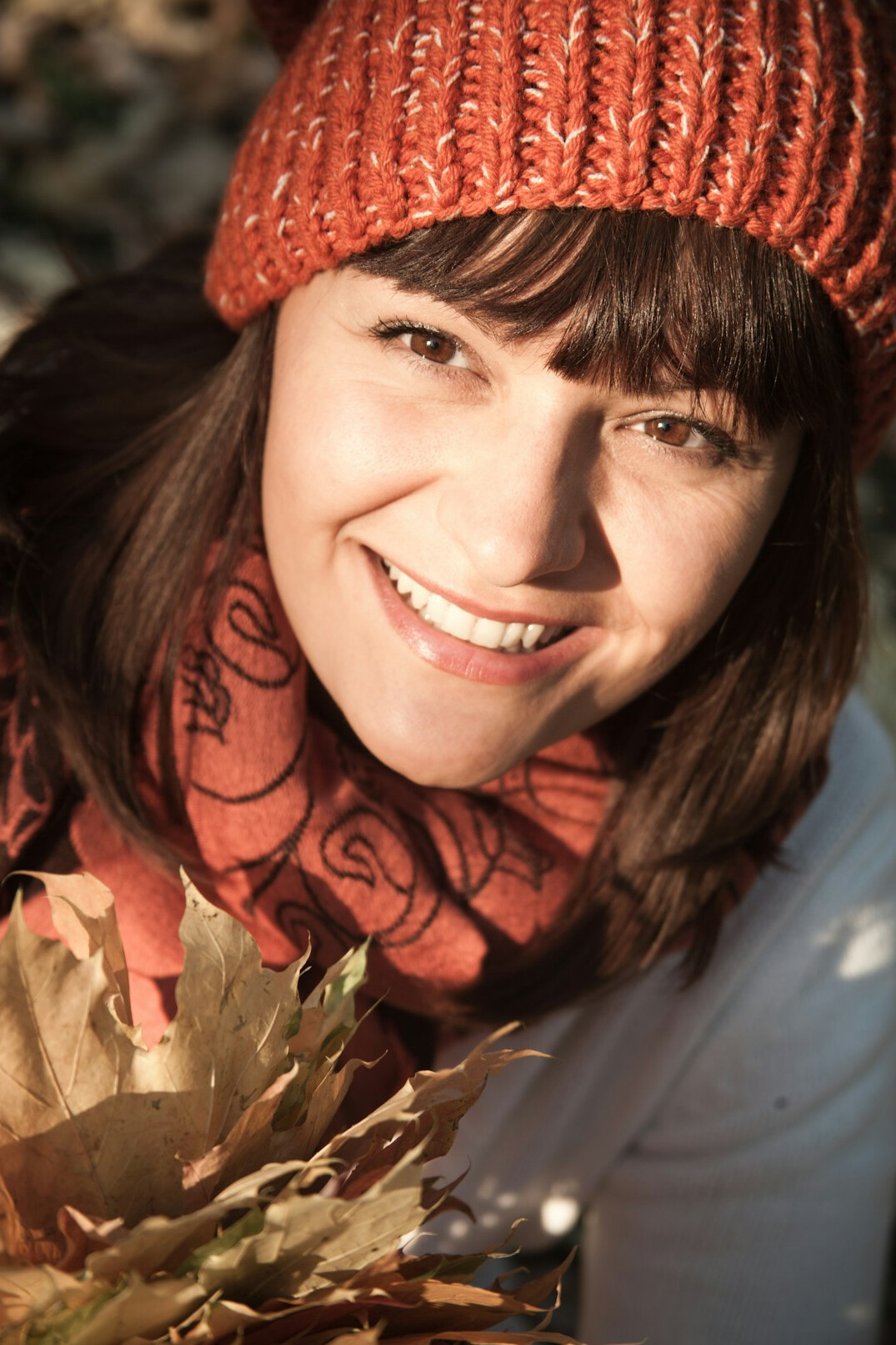 Portrait of a young woman with warm smile