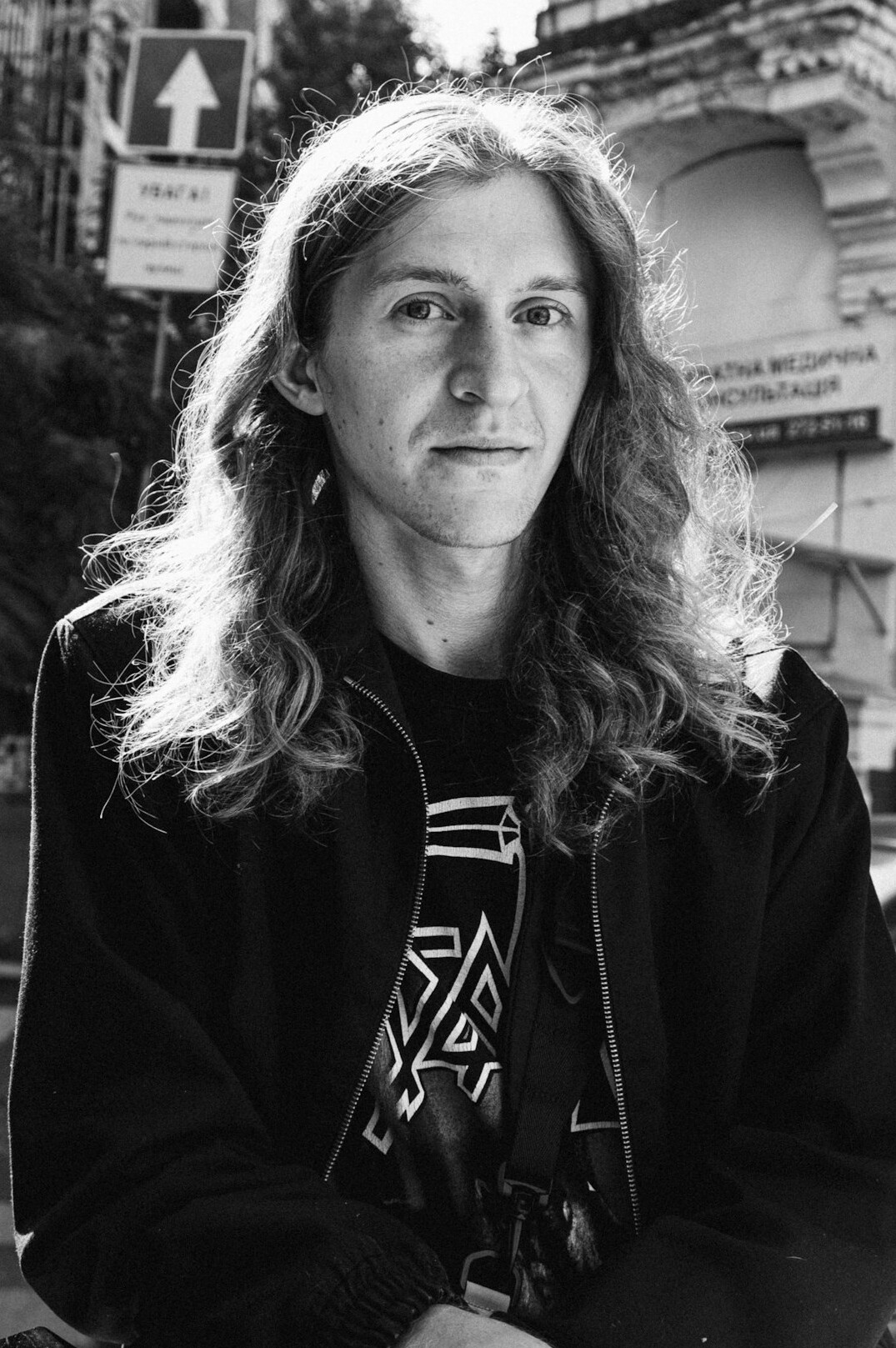 Portrait of a woman with long hair smiling