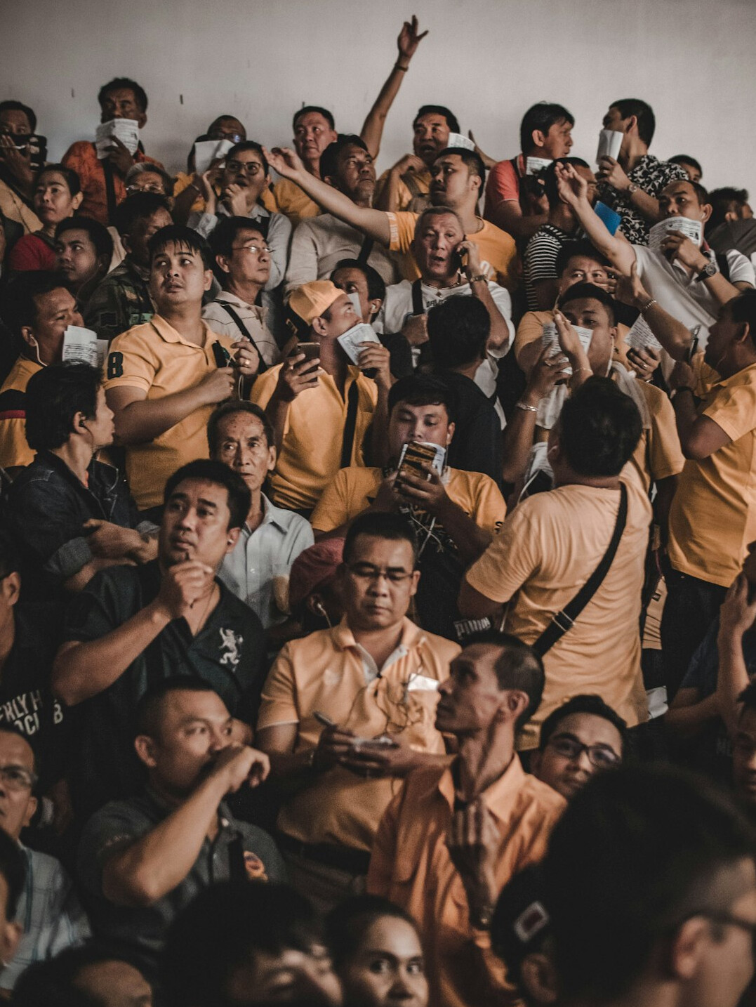 crowd reacting to advertisement